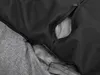A close-up view of the interior of a dog bed, showing the zipper and fabric textures. Produktbild-Vorschau