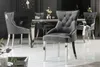 A dining room set with a table and chairs. Produktbild-Vorschau