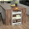 A white, 4-tier rolling storage cart filled with various kitchen items like bottles, jars, and packaged goods, placed next to a wooden kitchen island. Podgląd zdjęcia produktu