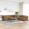 A living room scene with two Chesterfield sofas and a coffee table. Náhled obrázku produktu