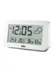 A white digital alarm clock with a weather station display. Produktbild-Vorschau