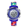 A digital watch with cartoon dinosaur and frog decorations. Produktbild-Vorschau