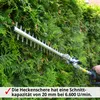 A hedge trimmer is being used to trim a dense green hedge. Produktbild-Vorschau