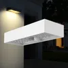 A modern white outdoor wall light with a motion sensor is mounted on a building's exterior wall at night. Produktbild-Vorschau