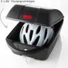 A black storage box for a bicycle or motorcycle, with a white helmet inside. Náhľad obrázku produktu