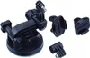 A set of black camera mounting accessories, including a suction cup mount and several adapter pieces, are arranged on a white background. Náhľad obrázku produktu