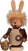 A wooden Easter bunny figurine holding a basket of eggs. Produktbild-Vorschau