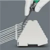 A gloved hand uses a specialized tool to connect wires to a terminal block. Produktbild-Vorschau
