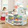 Two children playing in a toy supermarket. Podgląd zdjęcia produktu