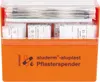 An orange first aid dispenser filled with various bandages. Náhled obrázku produktu