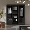 A modern bedroom with a large black wardrobe. Náhled obrázku produktu
