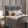 A bedroom scene with a bed and pillows. Produktbild-Vorschau