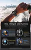 A person's arm wearing a smartwatch, with a background of water and a cityscape. Náhľad obrázku produktu