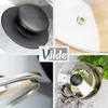 A collage of four close-up images showcasing details of a Vilde brand glass lid for cookware, including the handle, rim, and a view of the lid on a pot. Podgląd zdjęcia produktu