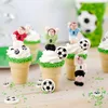 A collection of decorative soccer-themed cupcakes in ice cream cones. Anteprima dell’immagine prodotto