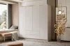A modern bedroom with a large wardrobe, a window seat, and decorative elements. Produktbild-Vorschau