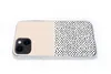 A phone case with a split design, half solid beige and half black polka dots, shown on a white background. Produktbild-Vorschau