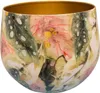 A close-up view of a decorative pot with a floral and leaf pattern. Produktbild-Vorschau