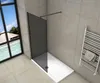 A modern bathroom with a walk-in shower, a large window overlooking a tropical scene, and a heated towel rack. Produktbild-Vorschau