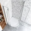 A modern bathroom corner shower stall with glass doors and a white base, set against tiled walls. Produktbild-Vorschau