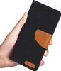 A hand holding a black flip case with a brown accent. Anteprima dell’immagine prodotto