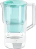 A clear water filter pitcher with a teal lid and filter reservoir, filled with water. Náhľad obrázku produktu