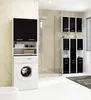 A modern bathroom with a washing machine and storage cabinets. Produktbild-Vorschau