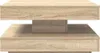 A close-up, straight-on view of a light wood-effect coffee table with a rotating top. Náhľad obrázku produktu