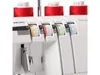 Close-up of the top section of a white sewing machine, showing thread spools and control dials. Náhled obrázku produktu