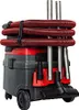 A wet and dry vacuum cleaner with accessories attached. Voir les images du produit