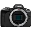 A front view of a black Canon EOS R50 mirrorless camera with the lens mount exposed. Voir les images du produit