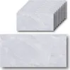A stack of self-adhesive wall panels with a marble-like pattern, and one panel shown individually below. Náhled obrázku produktu