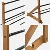 A collage of four close-up images showing the construction details of a wooden shoe rack with black metal rods. Anteprima dell’immagine prodotto