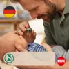 A father is holding a baby and offering a pacifier. There are overlay graphics including a German flag, a leaf and plug icon, and the NUK logo. Produktbild-Vorschau