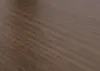 A close-up view of a textured brown surface, likely wood or a wood-like material. Anteprima dell’immagine prodotto