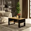 A living room scene with a couch, coffee table, and bookshelf. Anteprima dell’immagine prodotto
