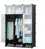 A modular wardrobe with hanging clothes and shoes on display. Podgląd zdjęcia produktu
