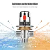 A close-up of a thermostatic water mixer valve with water spraying from it, indicating hot and cold water mixing. Náhled obrázku produktu