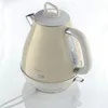A cream-colored electric kettle with silver accents is shown on a white surface. Anteprima dell’immagine prodotto