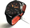 A close-up, angled shot of a black Seiko 5 Sports watch with an orange dial and strap. Náhľad obrázku produktu