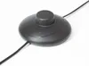 A black foot switch for a lamp on a white background. Produktbild-Vorschau