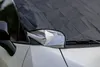 A close-up view of a car windshield cover, showing its reflective inner lining and how it attaches to the car's body. Náhled obrázku produktu