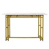 A modern dining table with a white marble top and gold metal legs, presented against a white background. Podgląd zdjęcia produktu