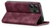A burgundy flip case for a smartphone is shown standing open, displaying the phone's camera module. Produktbild-Vorschau