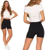 A woman is shown from the front and back wearing black leggings and a white t-shirt. Produktbild-Vorschau