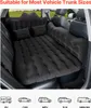 An inflatable mattress laid out in the back of a car. Produktbild-Vorschau