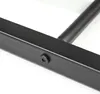 A close-up view of a black metal frame with a screw detail. Produktbild-Vorschau