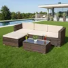 A patio furniture set is placed on a lawn next to a swimming pool, with a modern house in the background. Podgląd zdjęcia produktu