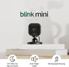 A Blink Mini smart camera is displayed on a stack of books, with feature icons and text below. Podgląd zdjęcia produktu