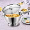 A stainless steel soup tureen with a lid, filled with soup, is displayed on a table with some side dishes and bowls of soup. Podgląd zdjęcia produktu
